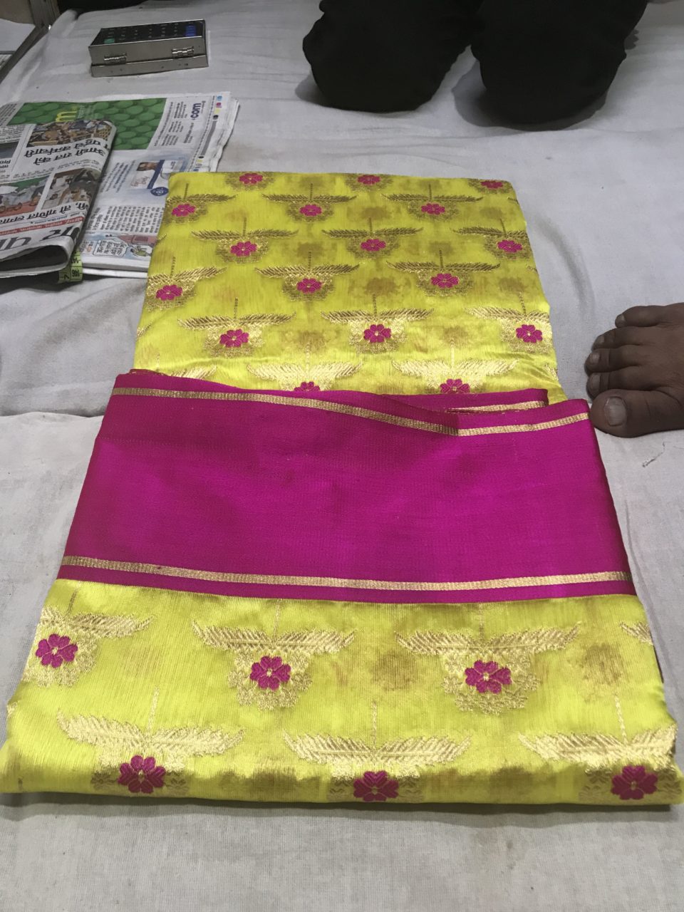 A saree being readied for sale